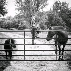 Eagle Ridge Ranch with boy, horse and mini horse