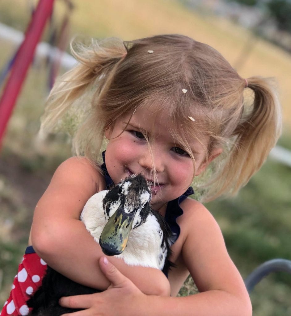 Girl Holding Duck