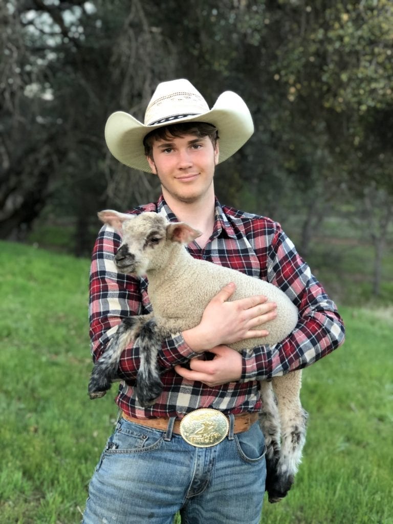 Braden Wanninger with his lamb